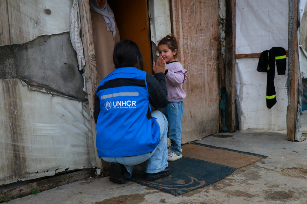 Lebanon. Shahed, Khadija's daughter with UNHCR staff Rozhan Gawdan